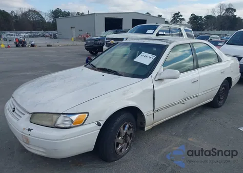 1999 Toyota Camry Le z USA, uszkodzony, nr VIN JT2BG22K1X0323278